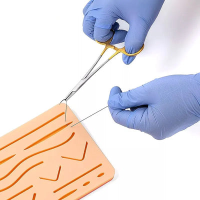 Estuche de disección de 20 piezas de instrumental quirúrgico Marca Hergom Silvery + Pad de sutura de 3 capas para prácticas e incisiones